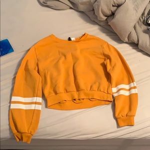 I am selling a yellow cropped sweater